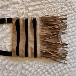 Crossbody bag with fringe trim